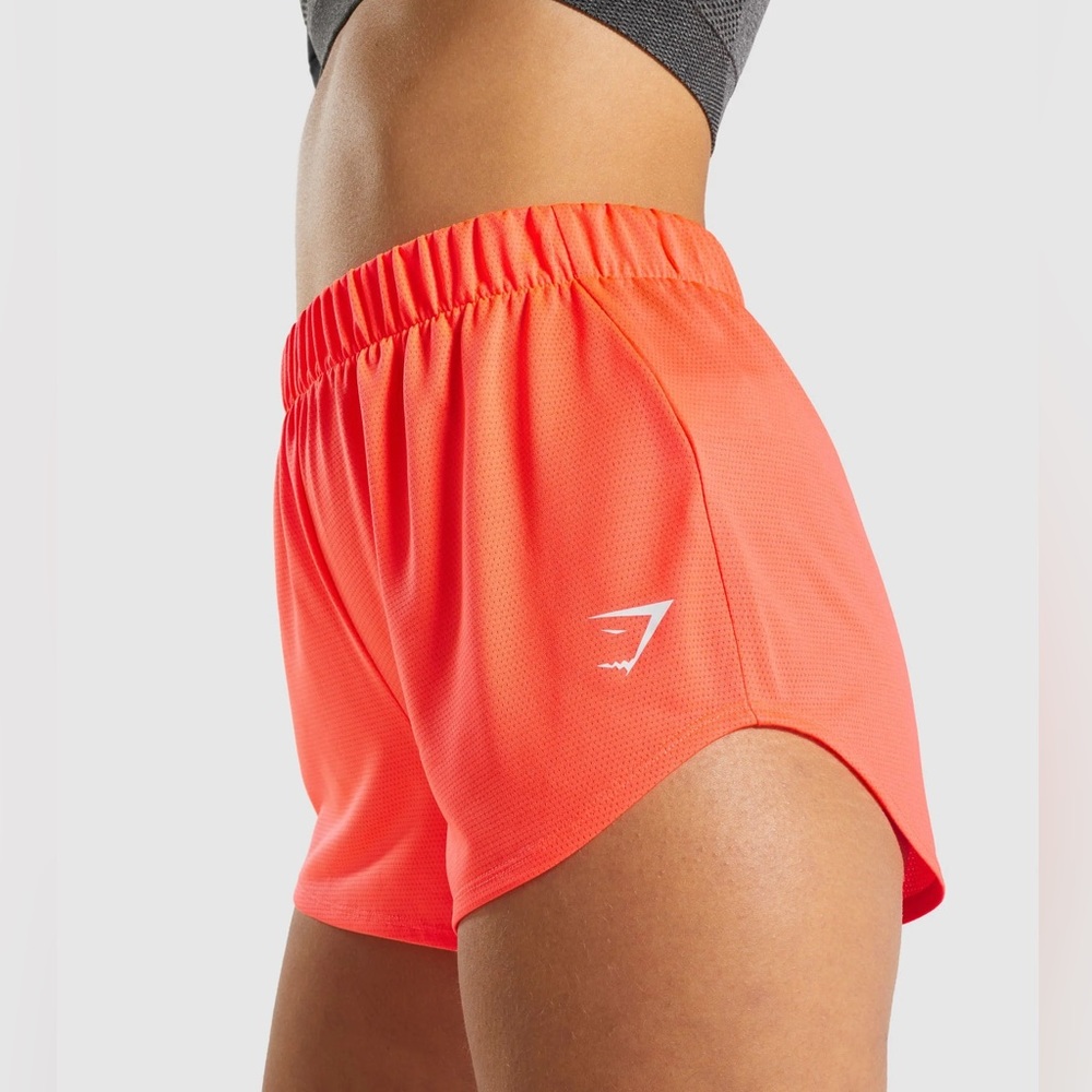 Gymshark mesh training shorts in coral